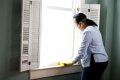 How do you remove mold from window caulking?
